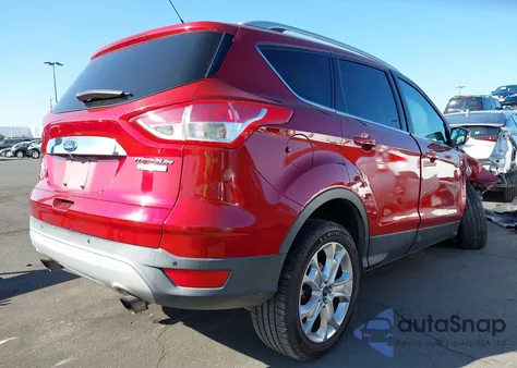2014 Ford Escape Titanium z USA, uszkodzony, nr VIN 1FMCU0J99EUC85291